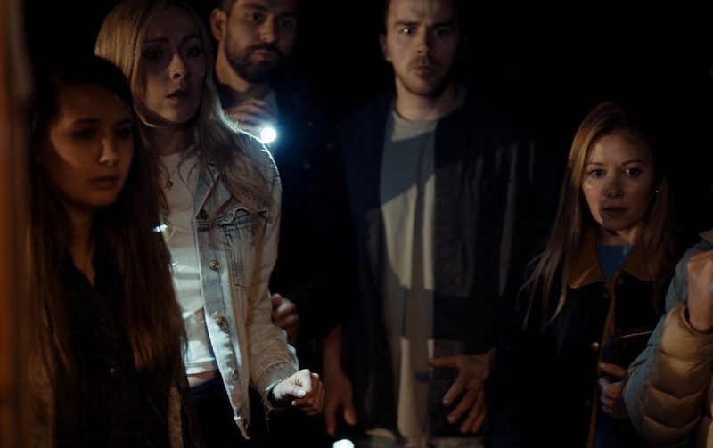 Group at door night